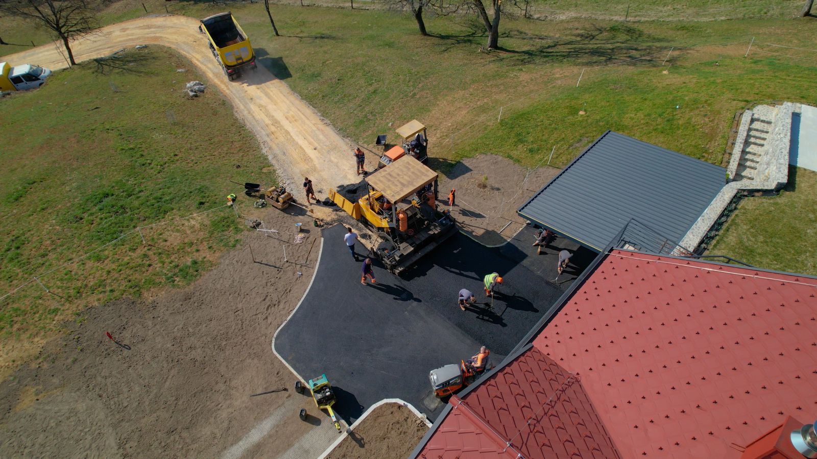 When to Replace Your Driveway: Coordinate with Roof Repair for a Complete Exterior Upgrade Image