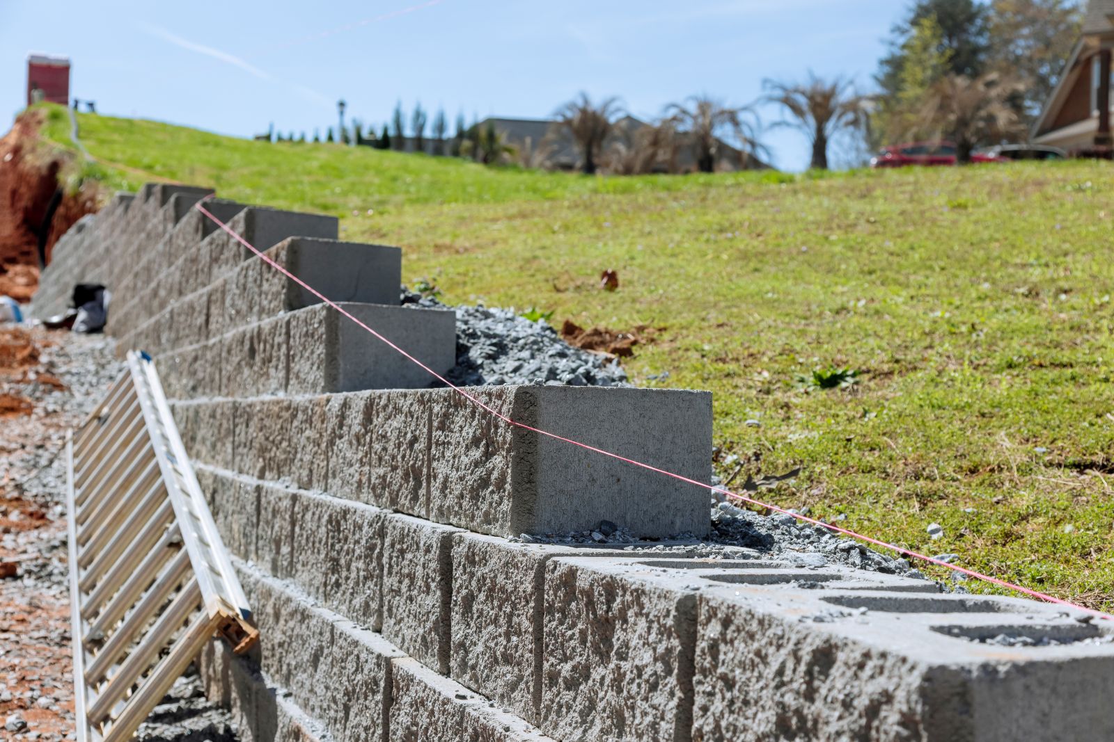 How Much Does a Retaining Wall Cost? Elevate Your Outdoor Space with a Patio Enclosure Image